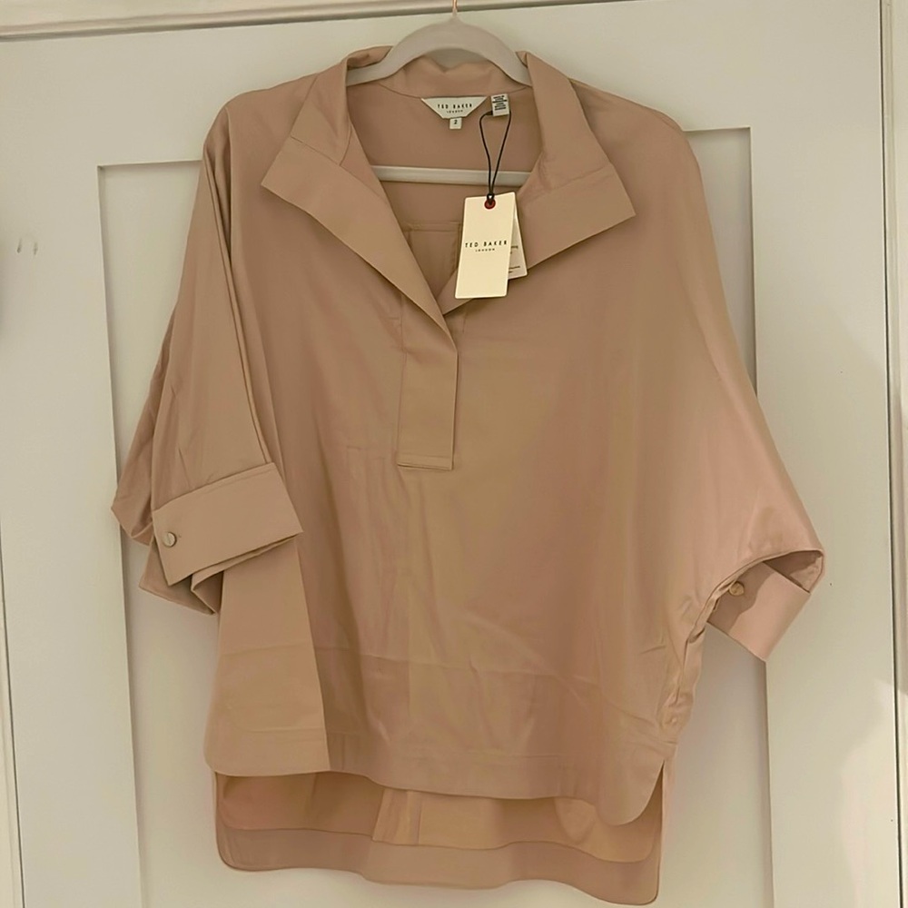 Brand new with tags rose color blouse